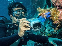 Diver with camera